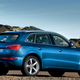 A blue Audi Q5 SUV